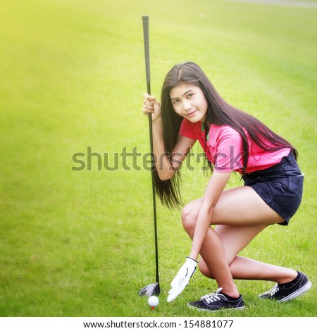 Young asian woman golf player