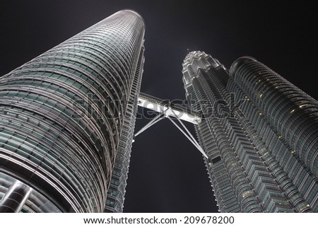 Kuala Lumpur, Malaysia - February 27, 2014: Petronas Twin Towers was the highest building in the world until 2004 when it was surpassed by Taipei 101. Today it still remains the tallest twin building.