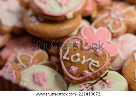 Gingerbread cookies. Decorated home baked gingerbread cookies with colored icing sugar.  Ready for Christmas or Valentine\'s Day