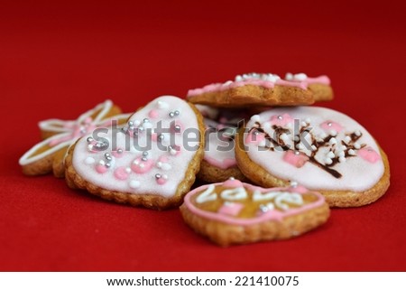Gingerbread cookies. Decorated home baked gingerbread cookies with colored icing sugar.  Ready for Christmas or Valentine's Day