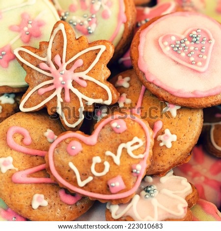 Gingerbread cookies. Decorated home baked gingerbread cookies with colored icing sugar. Ready for Christmas or Valentine's Day - beautiful gift.