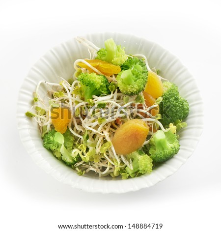 fresh healthy radish sprout salad with apricot and broccoli