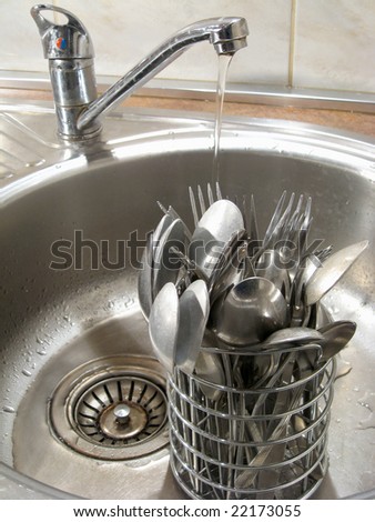 Table things washing in the stainless steel sink