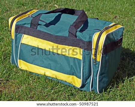 Simple cheap green bag on the grass