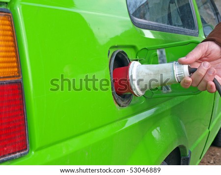 Green car using electricity as the fuel