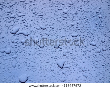 Water drops on car body after rain