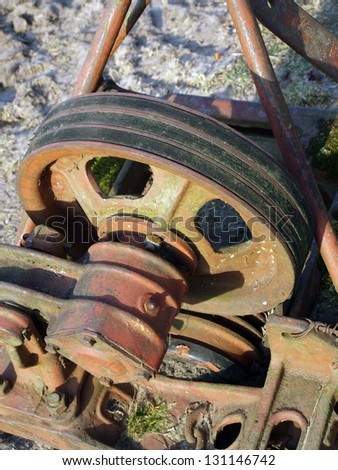 Old tractor mower transmission from three v-belts