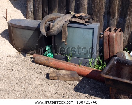 Old TV sets discarded to waste, outdoor