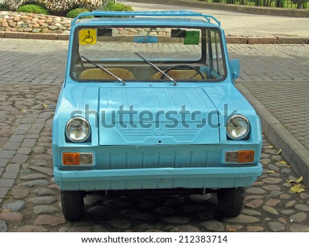 LIEPAJA, LATVIA - SEPTEMBER 6, 2008: Small vintage russian car for disabled persons is standing on parking place.