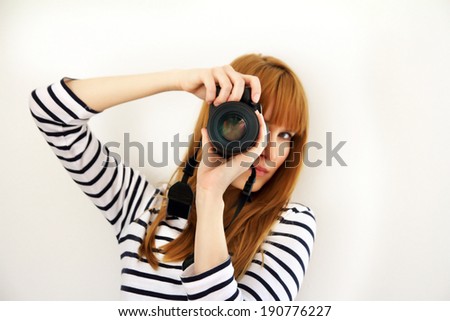 photographer woman holding camera