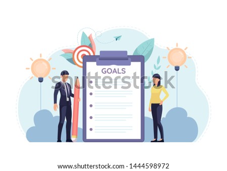 Businessman and businesswoman standing with goal setting checklist. Business goal setting and strategy concept.
