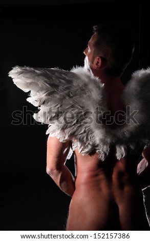 angel\'s man on black background