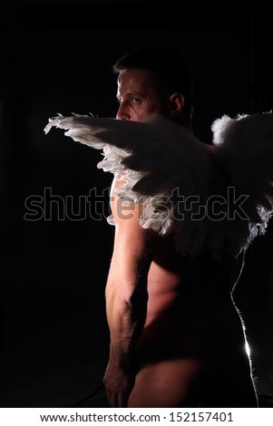 angel\'s man on black background