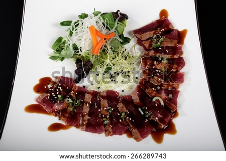dish of Japanese cuisine meat, rice, fish and vegetables