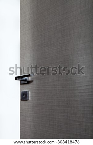 open gray door with the handle, on white background