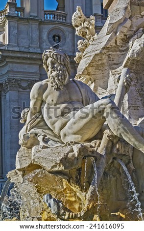 Fountain of the four Rivers in the middle of Piazza Navona, Rome. River-god Ganges