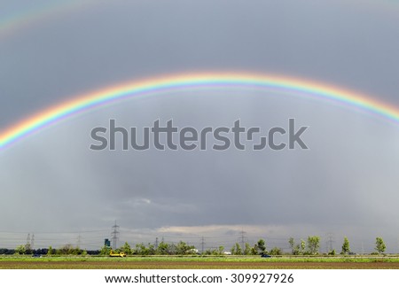 double rainbow in the sky after the rain