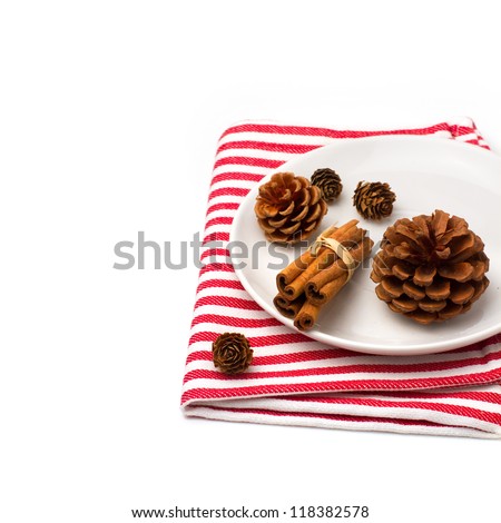 Festive christmas table arrangement with pine corn