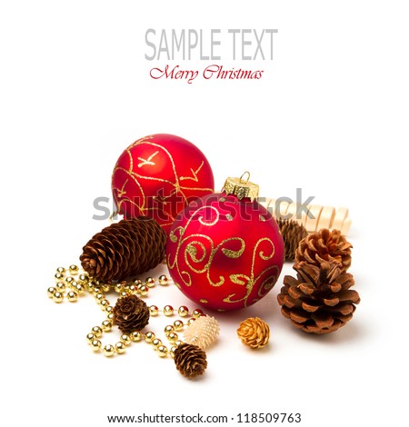 Christmas baubles and pine corn on white background