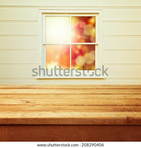 Autumn window with wooden counter for product montage