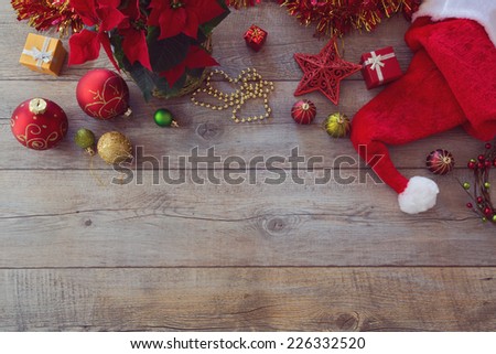 Christmas decorations and ornament on wooden background. View from above with copy space
