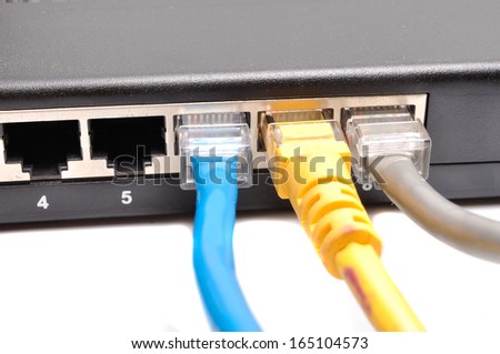 Close up of network cables connected to switch