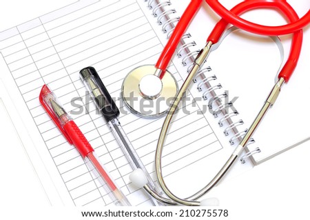 Medical records and stethoscope