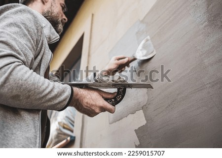 Similar – Image, Stock Photo Craftsman working with plaster in art studio