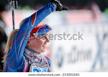 Nove Mesto na Morave, Czech Republic - February 7, 2015. Eva Puskarcikova greets fans in finish at the Biathlon World Cup Sprint Women.