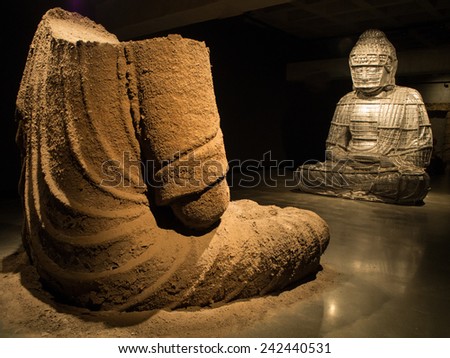 Hobart, Tasmania - September 15, 2014: Huge sculptures of Buddha image was exhibited inside Museum of Old and New Art (MONA). It is the largest privately funded museum in Australia