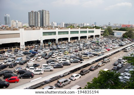 BANGKOK- MAY 25:Cars parked at a park and side lot at a BTS station in Chatuchak district on May 25,2014 in Bangkok,Thailand.Th e government has promoted park and ride to reduce traffic congestion.