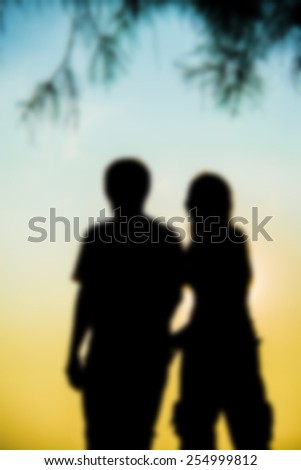 Lovely Couple walk together on sunset in Silhouette scene in Blur style