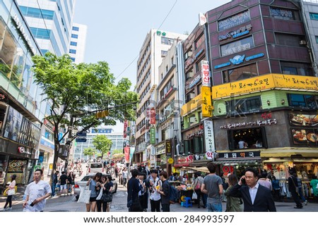 SEOUL, SOUTH KOREA - MAY 10 Myeong dongshopping street on May 10, 2015 in Seoul, South Korea. Myeong dong shopping street is center fashion of new generation in South Korea