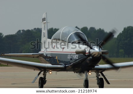 Hampton VA, May 14: USAF T-6 Texan II  taxis back after an air demonstration during the Langley AFB on May 14, 2005.