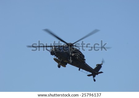 FAIRFORD, UK - JULY 16, 2005: Italian Army A129 Mongusta attack helicopter hovers during an air demonstration at the Royal International Air Tattoo on July 16, 2005 in Fairford, UK.