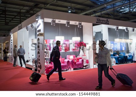 MILAN, ITALY - SEPEMBER 12: Booths and people walking in Macef, International Home Show Exhibition on September 12, 2013 in Milan, Italy