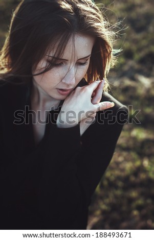 emotional portrait beautiful expressive woman wind hair. outdoor fashion photoshoot