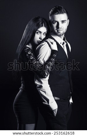 fashion man and woman love couple portrait. vogue style vintage photo. Classic wear elegance.