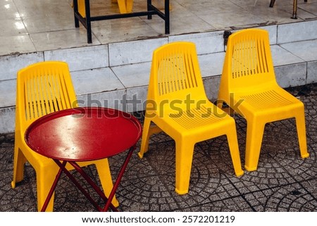 Similar – Image, Stock Photo Yellow, cheerful, empty seats from the chain carousel turn around in a circle, deserted, in front of a blue sky. Closed carousel at the fair, turns without guests. Crisis, closure, bankruptcy, bankruptcy, bankruptcy of the passenger business by Corona.