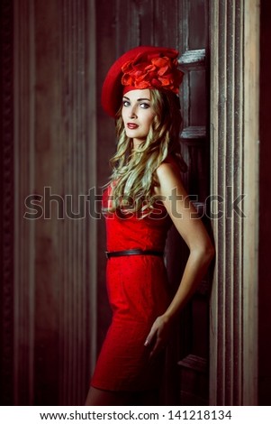 Retro girl in a red hat lady in red
