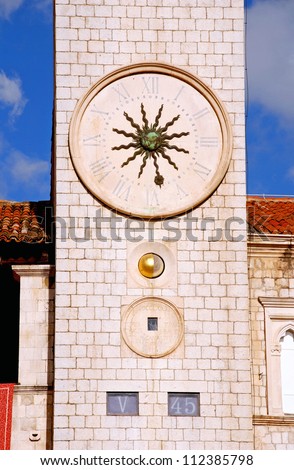 Famous clock tower of Dubrovnik, Croatia. The Clock Tower was built in the heart of the old city Dubrovnik by the main street of the Stradun in the 15th Century.