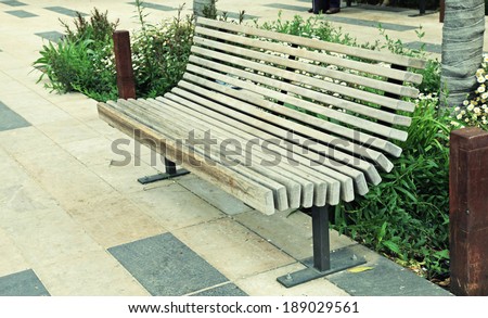 modern wood bench on the city street