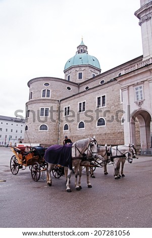SALZBURG, AUSTRIA - JANUARY 05, 2013: Carriage horses waiting for tourists in Salzburg, Austria