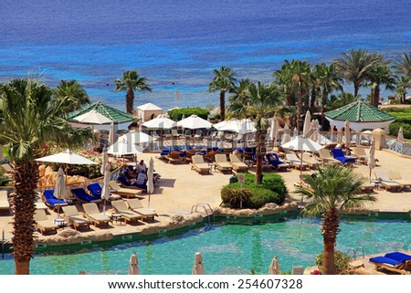 SHARM EL SHEIKH, EGYPT - MAY 03, 2014: Tropical luxury resort hotel on Red Sea beach in Sharm el Sheikh, Egypt.