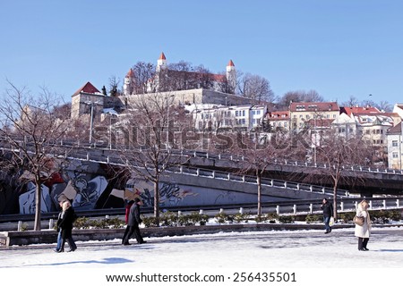 BRATISLAVA, SLOVAKIA - FEBRUARY 3, 2015: City view with Bratislava castle on the hill, Bratislava, Slovakia. Bratislava is the capital and most visited city in Slovakia.