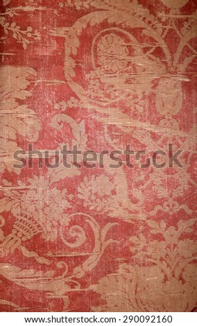 Vintage red wallpaper with golden shabby fabric victorian pattern