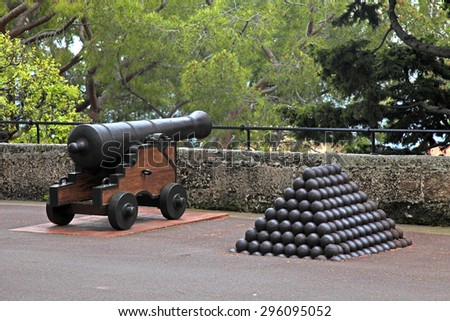 Cannon and cannon balls near Royal Palace, official residence of the Prince of Monaco. Selective focus