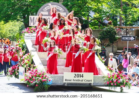 Portland, Oregon, USA - JUNE 7, 2014: 2014 Rose Festival Court in Grand floral parade through Portland downtown.