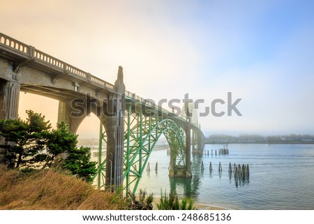 Large old bridge over Yaquina Bay at Newport, Oregon on the central Oregon coast, along Hwy 101.