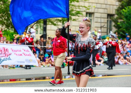 Washington, D.C., USA - July 4, 2015: Waltrip High School Roarin\' Red Ram Band in the annual National Independence Day Parade 2015.